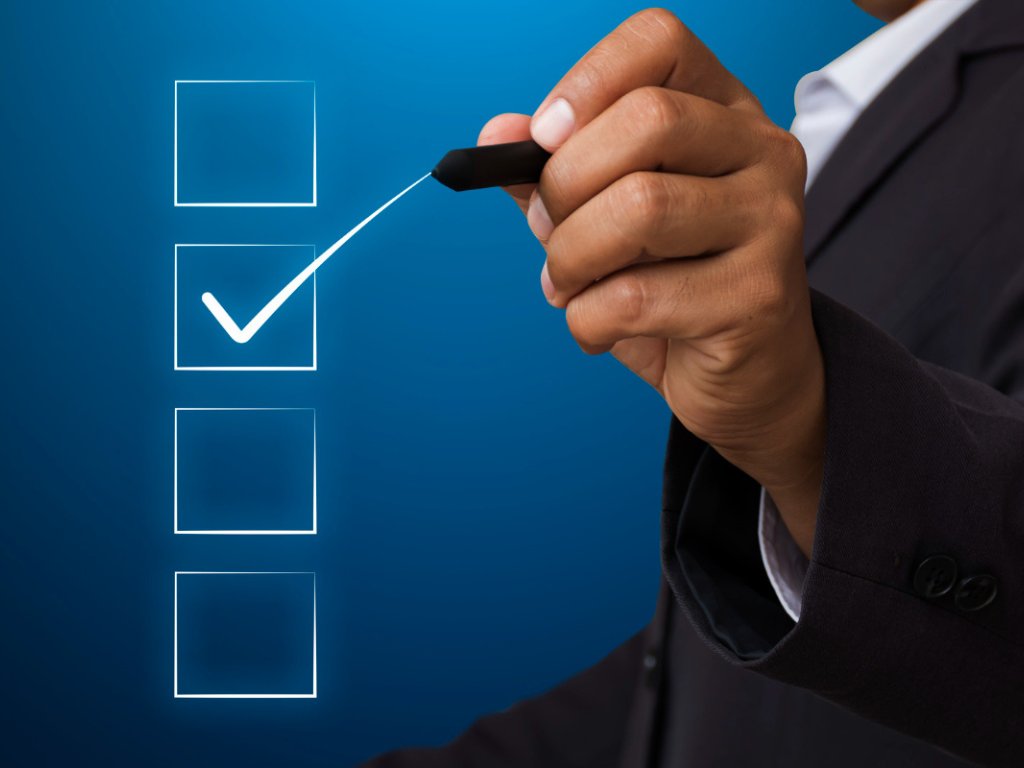 business-man-with-pen-mark-checkbox