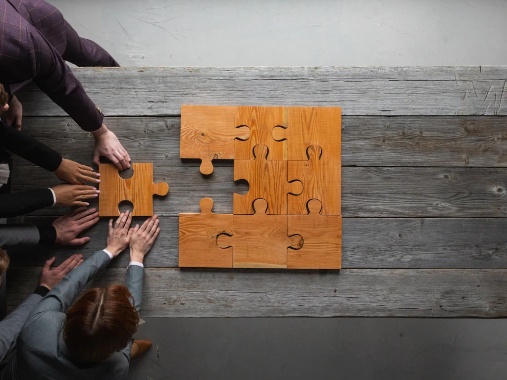 Business teamwork with puzzle