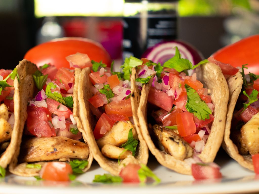 mexican tacos with toppings front view