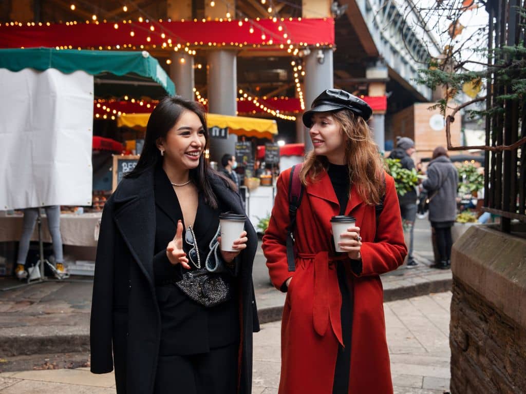 Houston’s best Christmas activities Two young women strolling a Christmas market